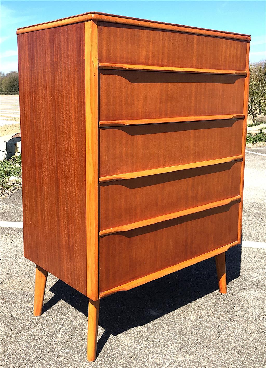 A mid century design mahogany and teak five drawer chest, circa 1960, width 77cm, depth 45cm, height 107cm